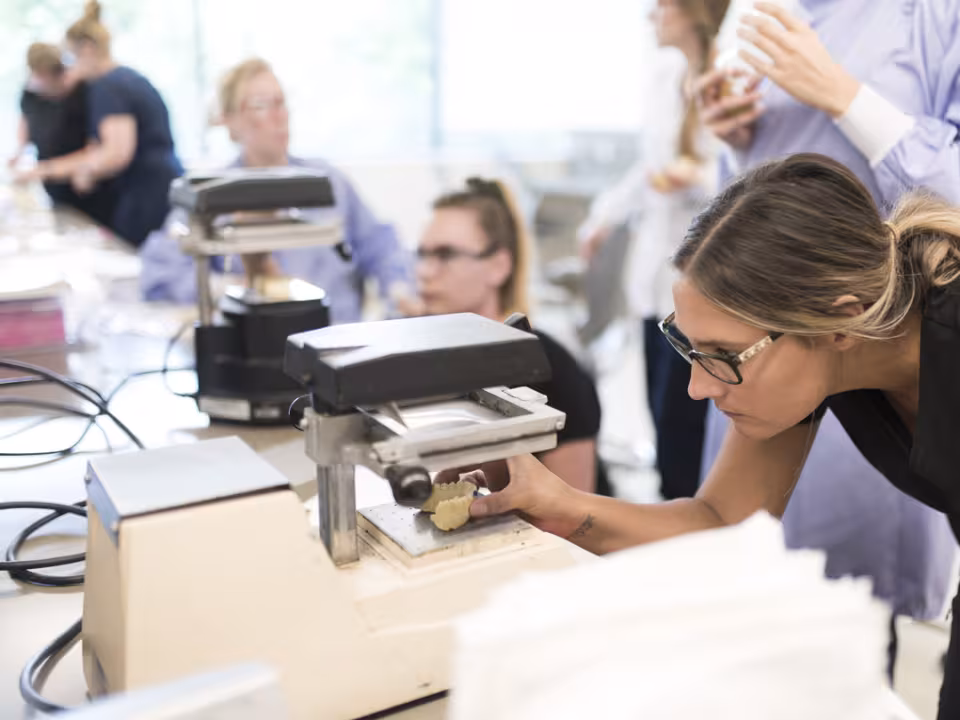 Dental student making an impression of teeth