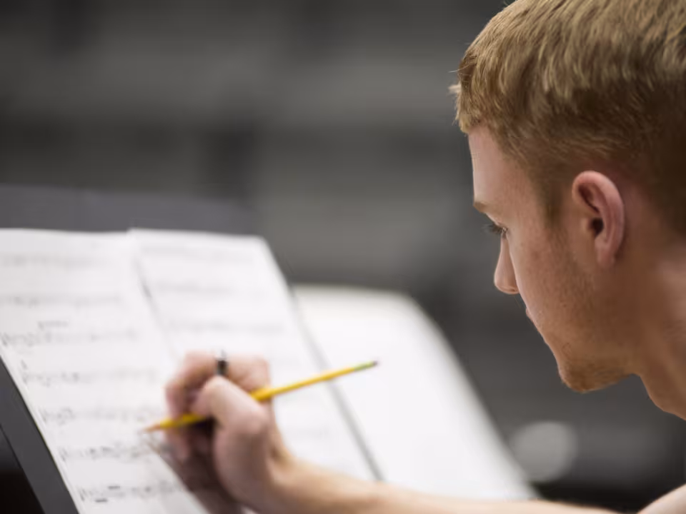 GRCC student writing music.