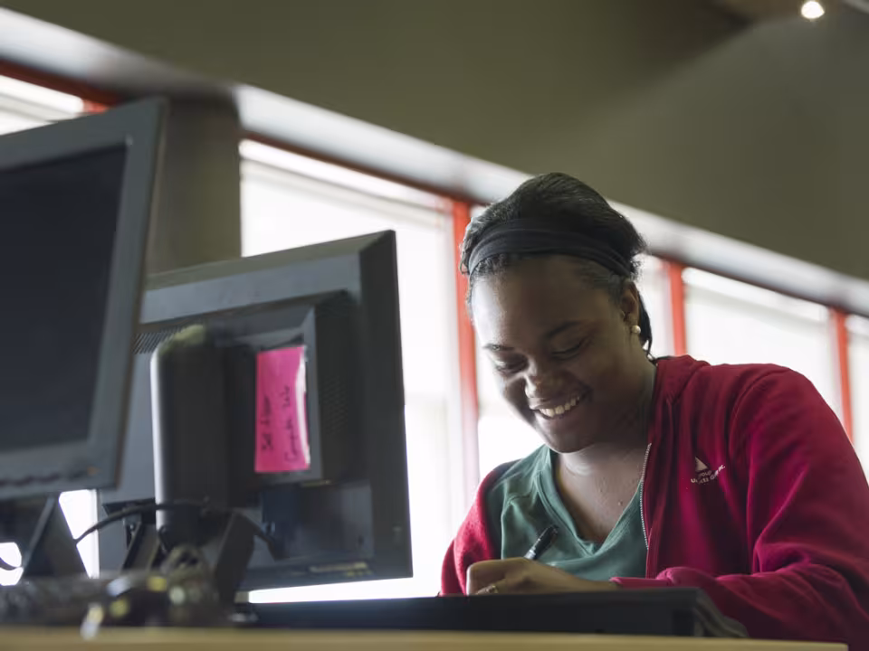 GRCC student working on a computer