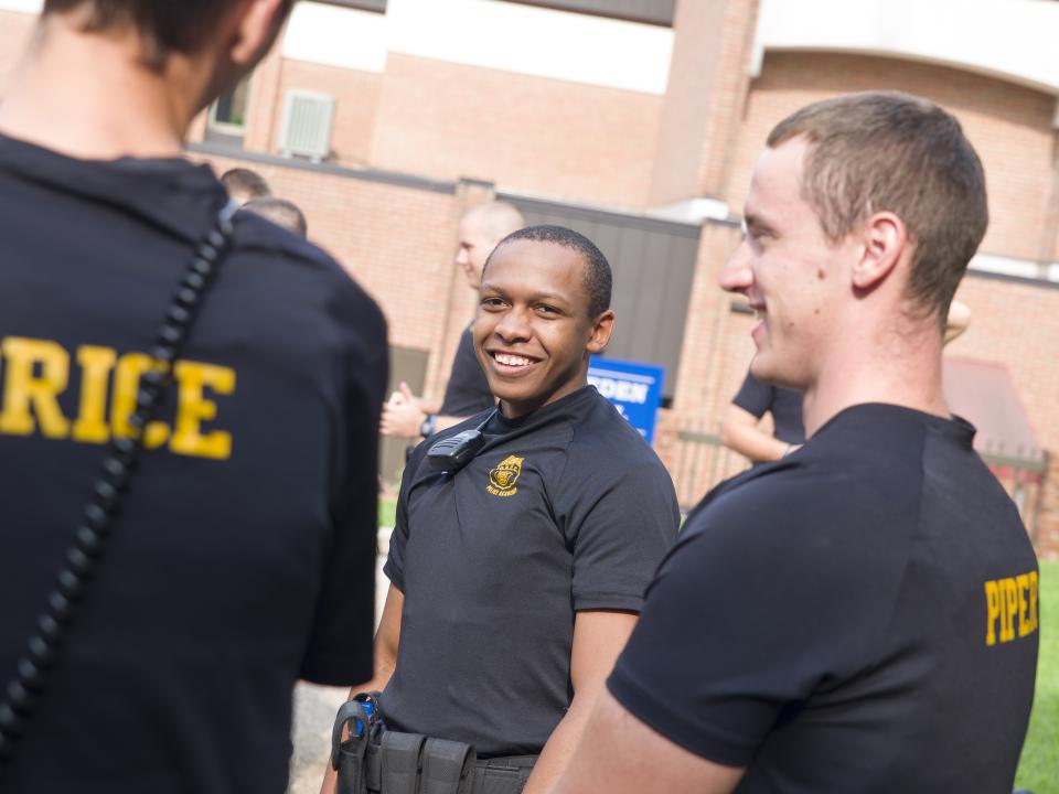 Criminal justice students outside in uniforms