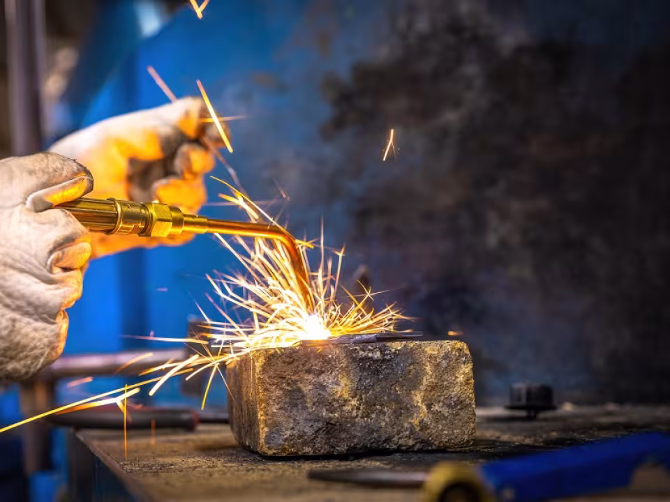 Student welding in class.