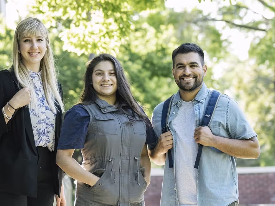 Students standing outside the library