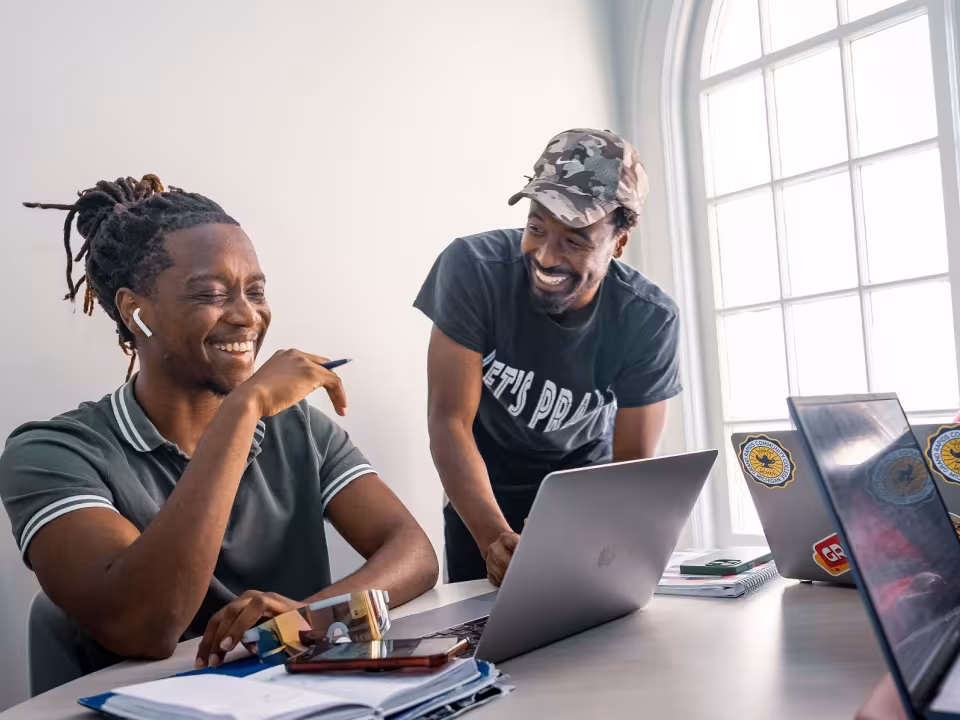 Students working on a laptop