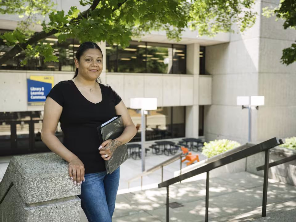 student outside the library
