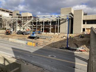The exterior construction site with welded steel beams.