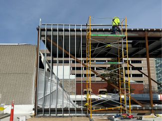 A person works on the penthouse.