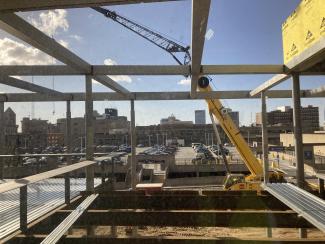 A crane working on steel beams