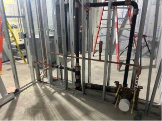 Rough-in plumbing in a bathroom.