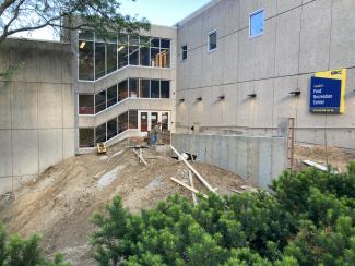 The retaining wall is near completion.