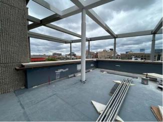 Parapet blocking on west side terrace