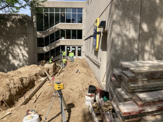 Workers setting the forms up for the retaining walls.