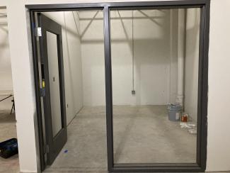 The building manager’s office with a newly installed door.  No glass yet though!