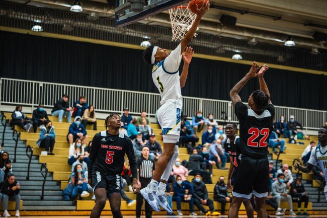 Andrew Moore jumping for a shot.
