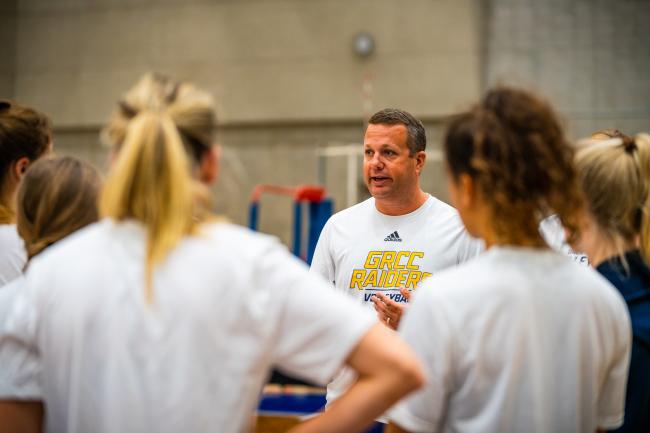 Coach Chip Will talking with students earlier this season. 