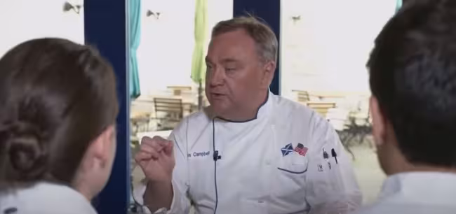 Chef Angus Campbell speaks with former students.