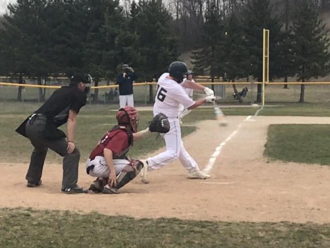 A GRCC batter in action on Saturday.