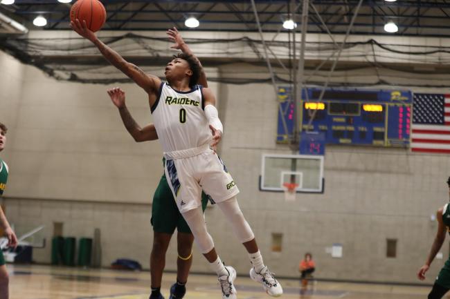 Danyel Bibbs leaping for a ball. 