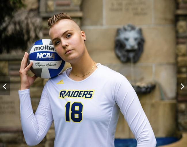 Alena Visnovsky posing with a volleyball.