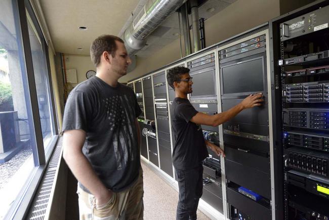GRCC CIS students working on hardware.