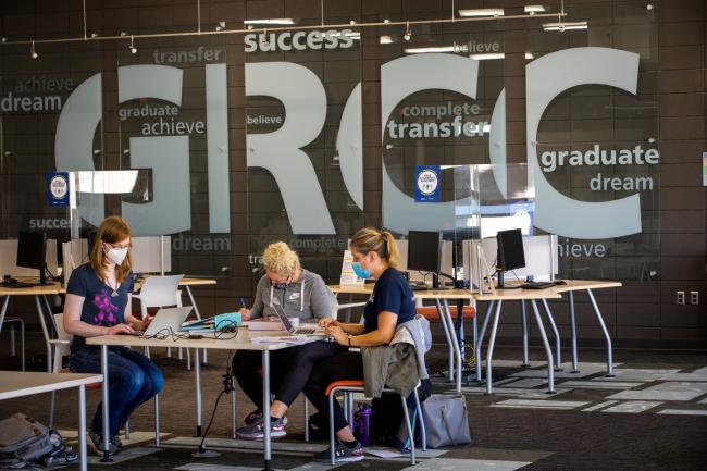 Students sitting in the GRCC advising and transfer center.