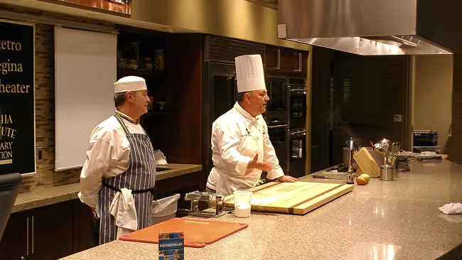 Chefs Nicola Conte and Angus Campbell working with GRCC students.