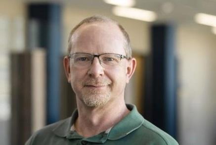 Portrait of Christopher Schell.