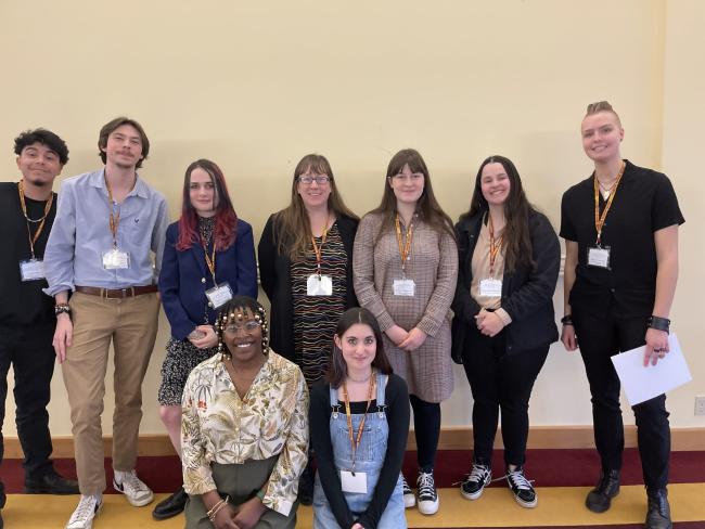 Collegiate students posing at the event.