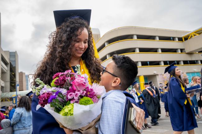 Fabiola Carrillo Esparza and her son at commencement last year.