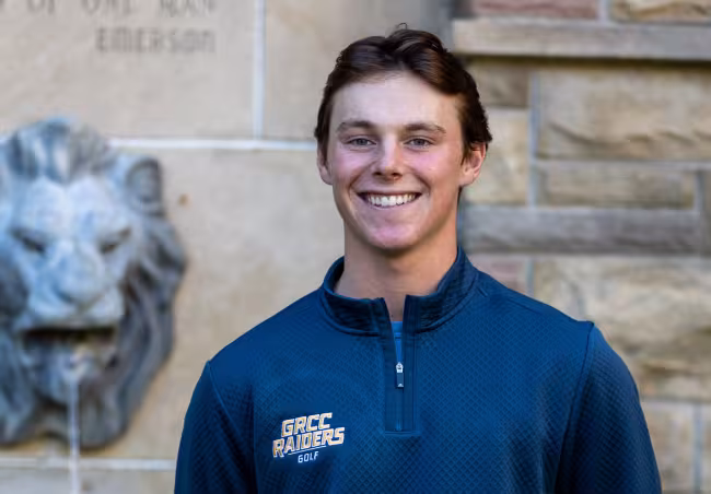 Portrait of Drew Harrington near the iconic lion fountain.