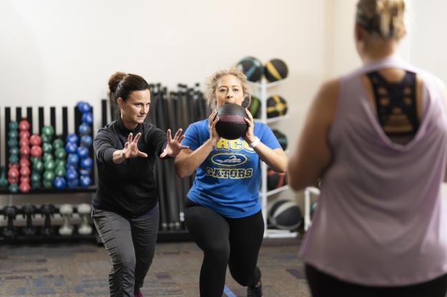 Department head Jody Gee working with students.