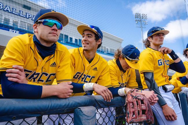 GRCC baseball players in the dugout.