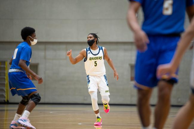 GRCC Raiders men's basketball team in action.