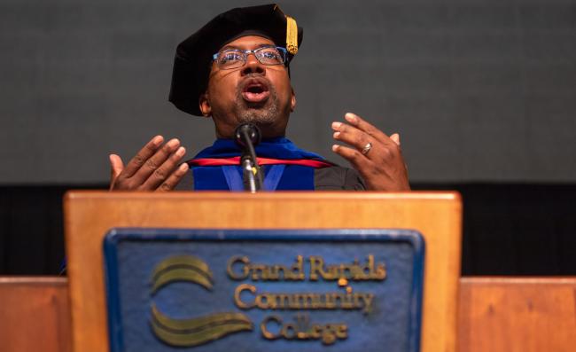 GRCC President Pink speaking at the podium during commencement in 2020.