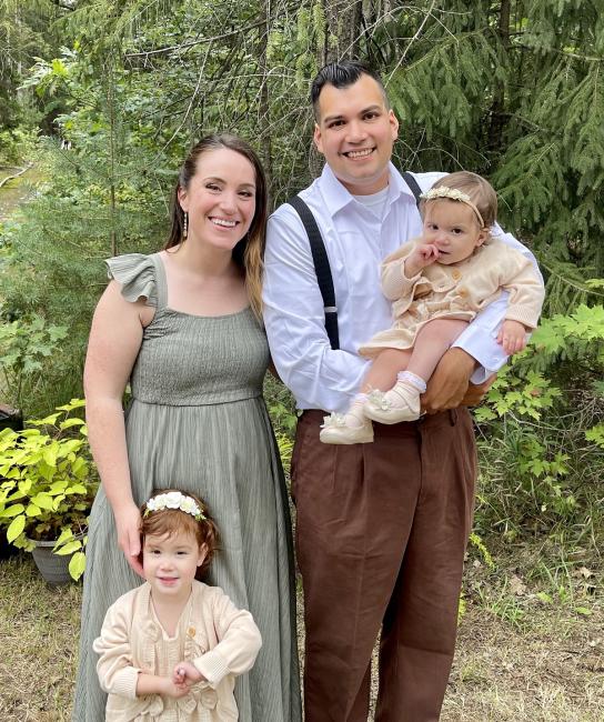 George Muyskens poses with his family
