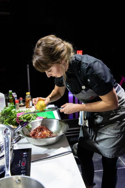GRCC's Chef Jenn Struik prepares food for a meal