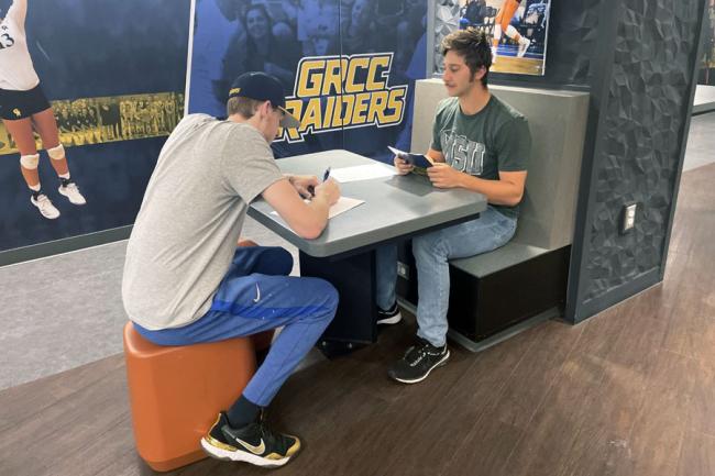 Mentor Blake Waibel working with student-athlete Payton Chase.