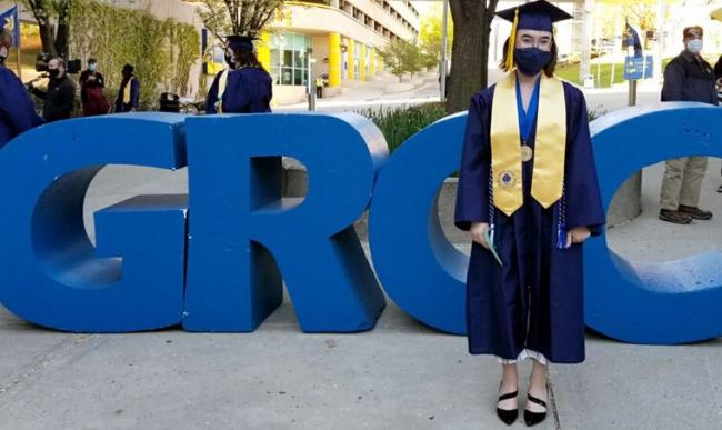 Voca Ford prior to GRCC's commencement by the large letters.