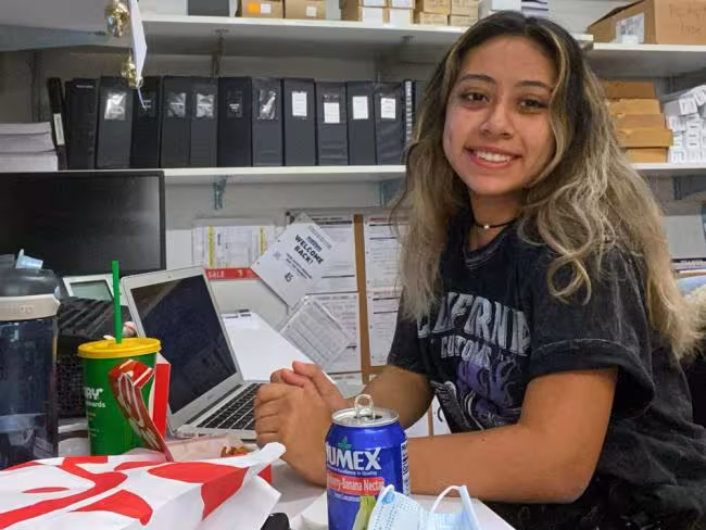 Student studying on a laptop