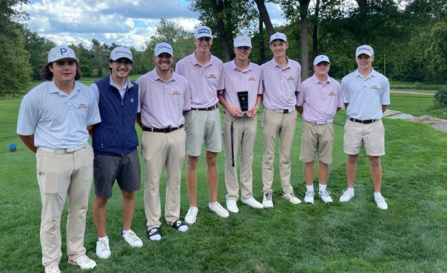 Golf team posing at Aquinas Invitational.
