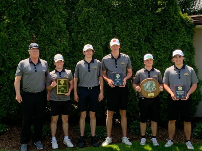 The GRCC golf team holding trophies after competition on Tuesday.