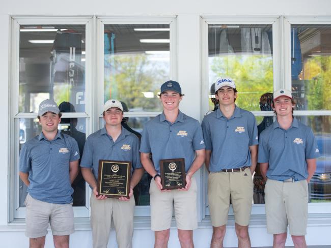 GRCC golf team holding awards after the NJCAA Region XII tournament.