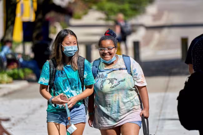 Students walking on campus. 