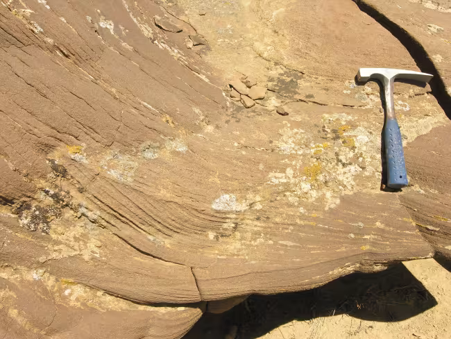 A hammer lies on a rock in 12-mile Gulch in Wyoming