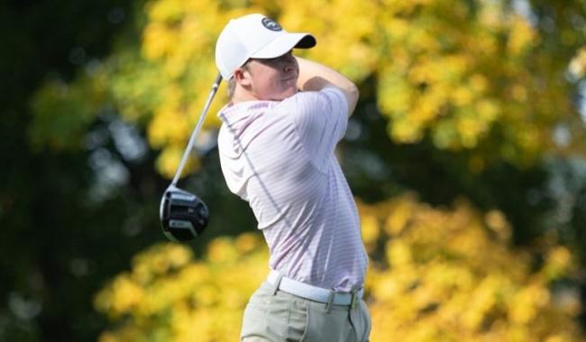 Arie Jackman golfing.