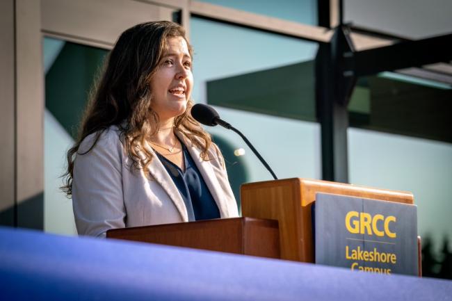 Kelsey Sivertson  speaking at the ribbon-cutting. 