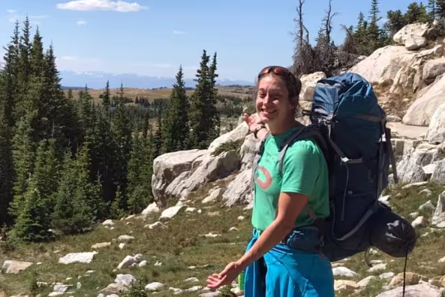 Mary Forrnier hiking in the mountains. 