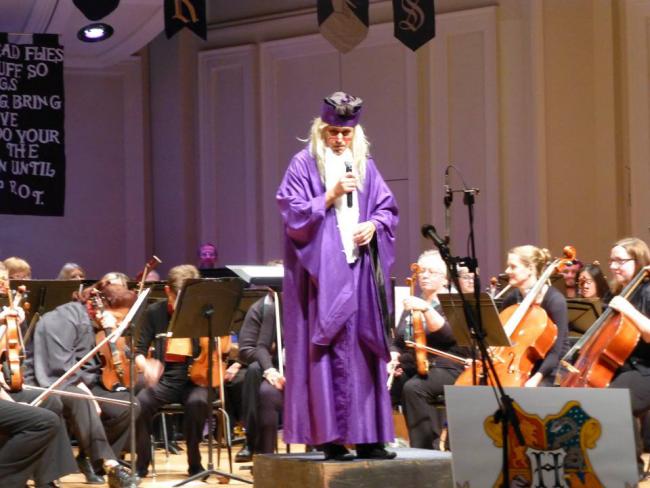 Libor Ondras, dressed as Dumbledore, conducts the Kent Philharmonic Orchestra.