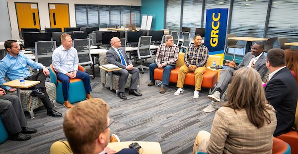 A group of people at GRCC speak with Lieutenant Governor Garlin Gilchrist II