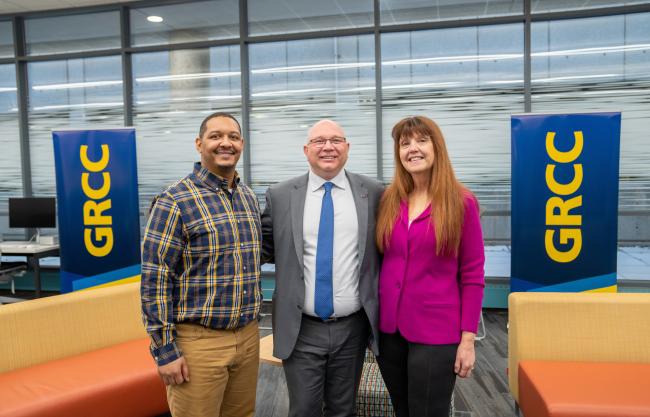 GRCC President Lepper with studens Andre Broussard and Jodi Holland. 