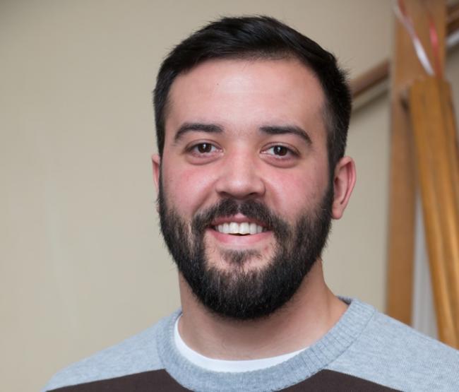 Portrait of Adam Jacobs.